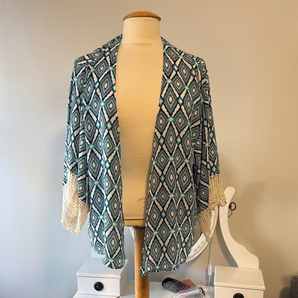 Peach Love California Jackets & Blazers - 💜Multicolor Geometric Cape with Fringe